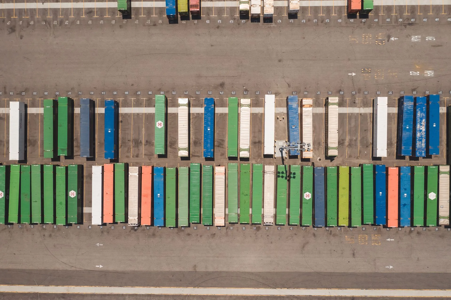 Aerial view of an organised shipping container yard